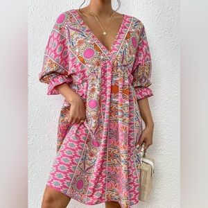 Floral print boutique flounce style dress. Size M